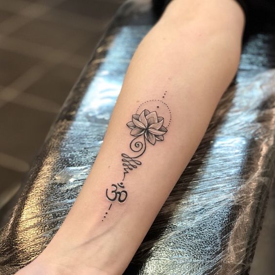 The lotus flower tattoo with om